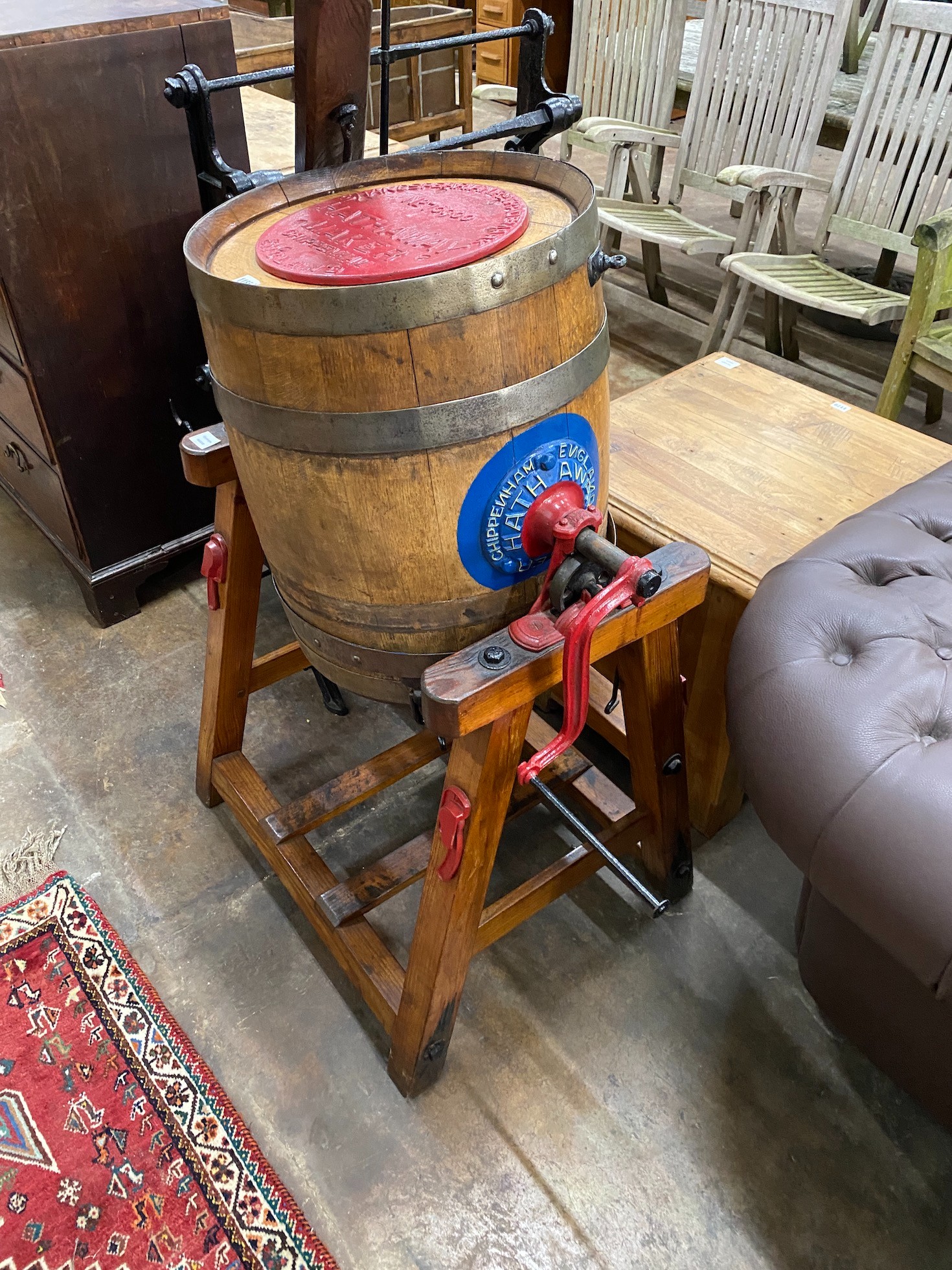 An early 20th century iron bound coopered oak butter churn, by Hathaway of the Chippenham Cheese Factory, Chippenham, Wiltshire, height 114cm *Please note the sale commences at 9am.